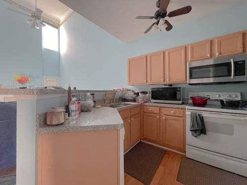 147 Benfield Circle Southeast Cartersville, GA 30121 - Photo 7 of 18 a kitchen with a sink cabinets and window