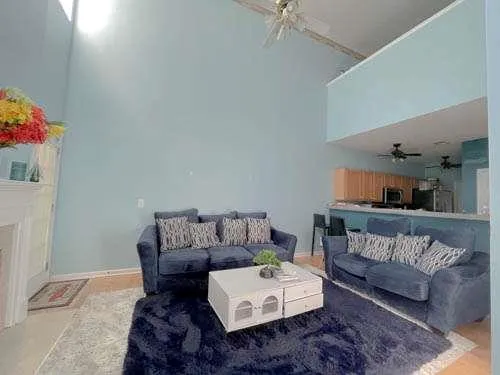 a living room with furniture and a couch
