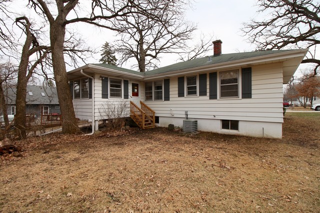 1460 Burr Oak Road Homewood, IL 60430 - Photo 16 of 19 a front view of a house with a yard