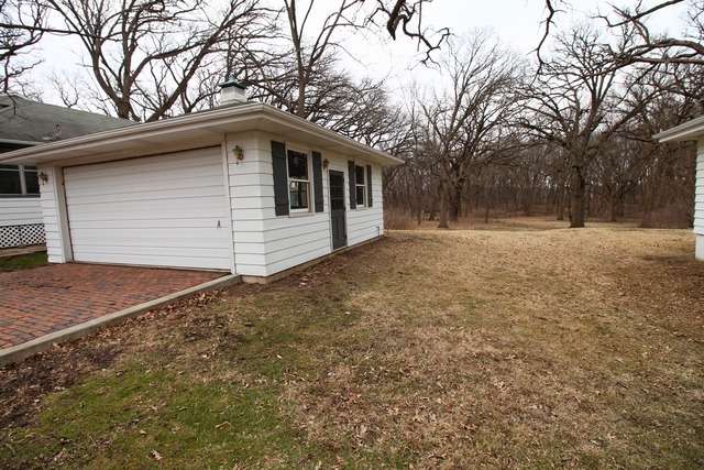 1460 Burr Oak Road Homewood, IL 60430 - Photo 17 of 19 a backyard of a house with large trees