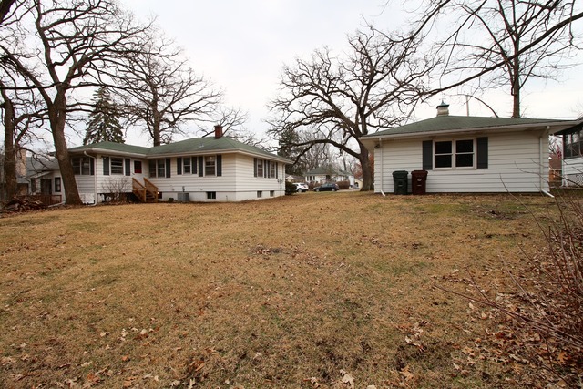 1460 Burr Oak Road Homewood, IL 60430 - Photo 18 of 19 a view of a house with a yard