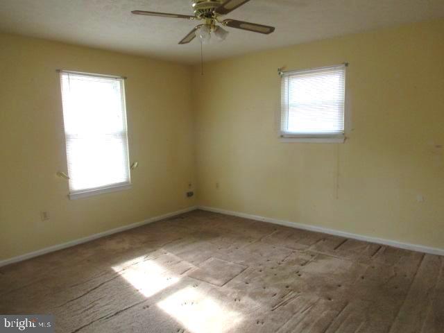 665 Flagstaff Road Lusby, MD 20657 - Photo 3 of 11 an empty room with a window