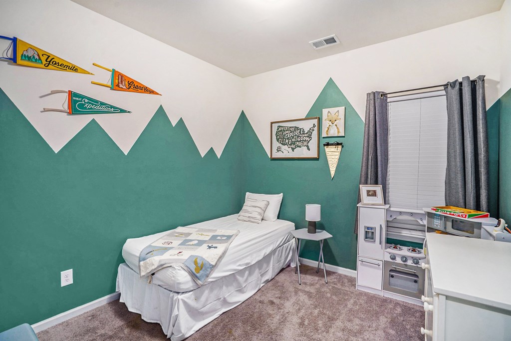206 Worley Drive Jasper, GA 30143 - Photo 12 of 17 a bedroom with a bed and a window