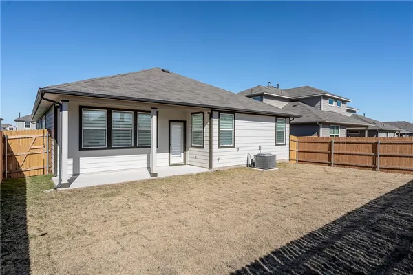 a house with trees in front of it