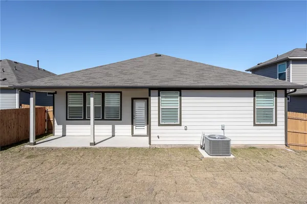 a house with yard in front of it