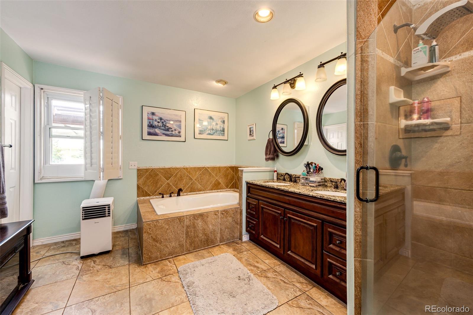2218 Deerpath Road Franktown, CO 80116 - Photo 21 of 46 a living room with furniture and a large window