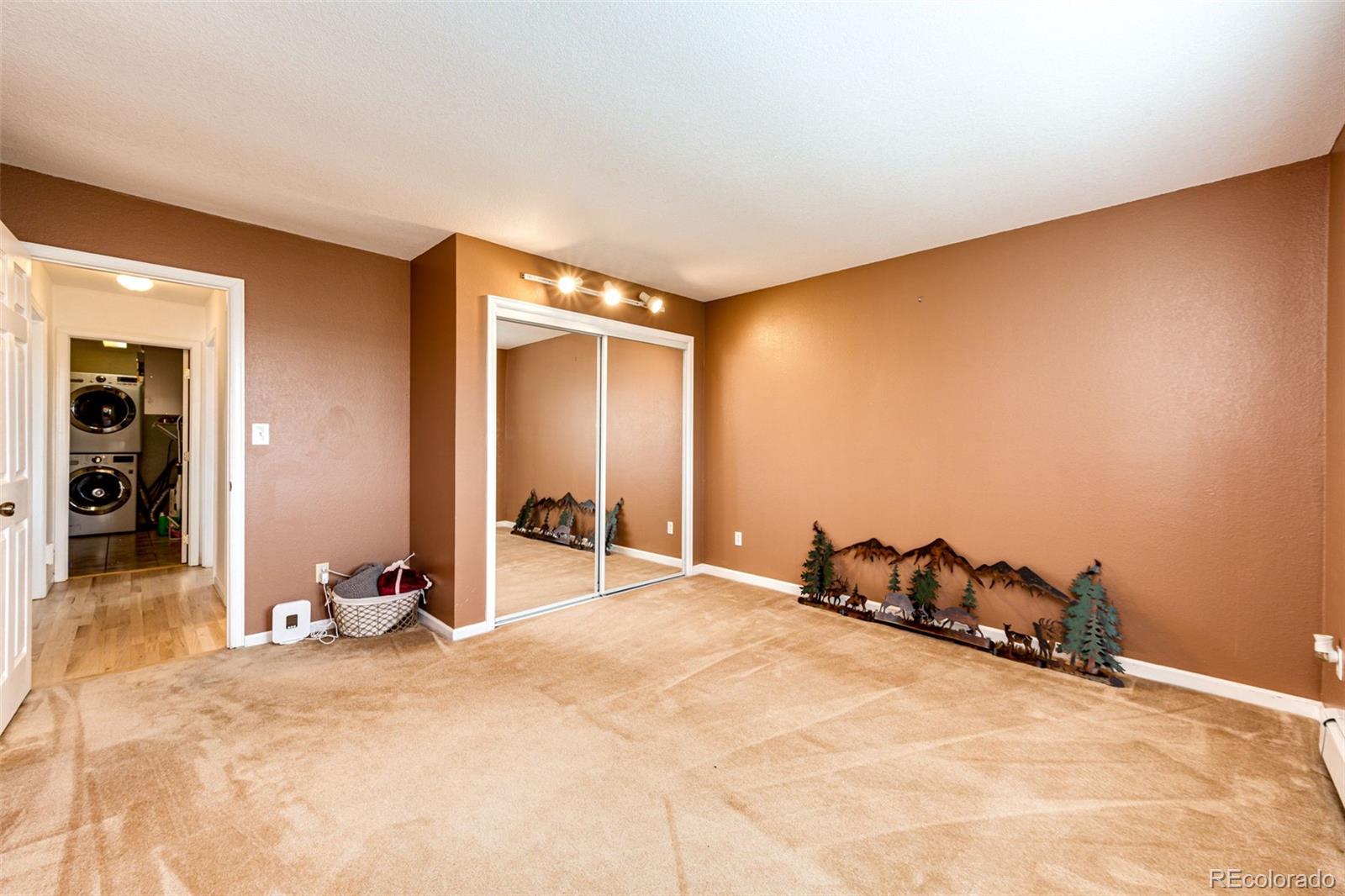 2218 Deerpath Road Franktown, CO 80116 - Photo 27 of 46 a view of a room with a gym equipment