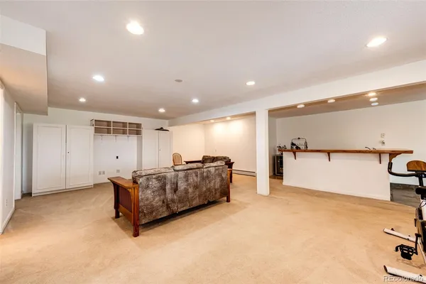 a living room with furniture and a table
