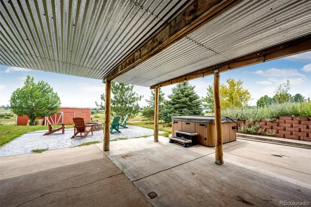 a view of a street with sitting area