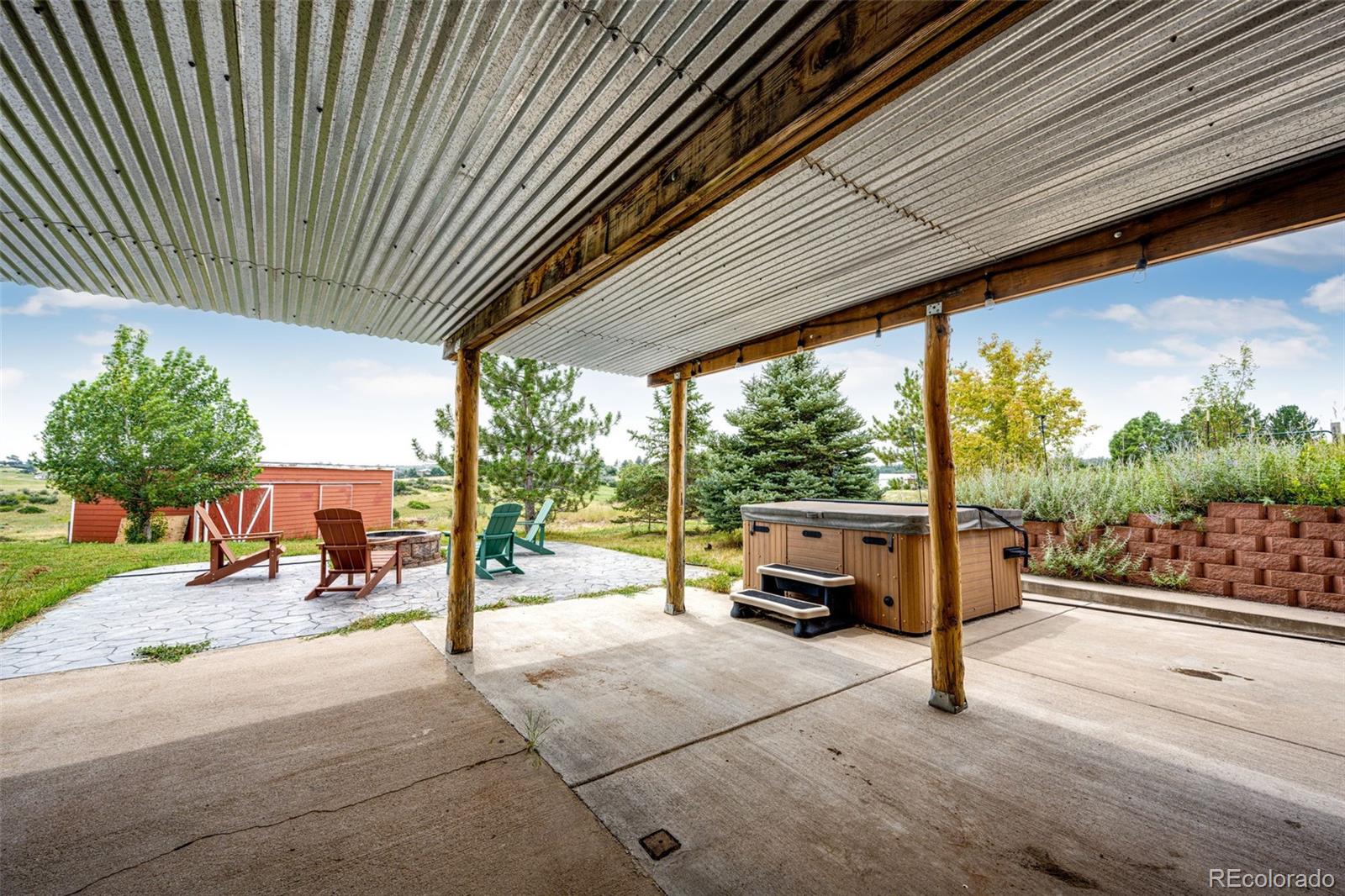2218 Deerpath Road Franktown, CO 80116 - Photo 40 of 46 a view of a street with sitting area