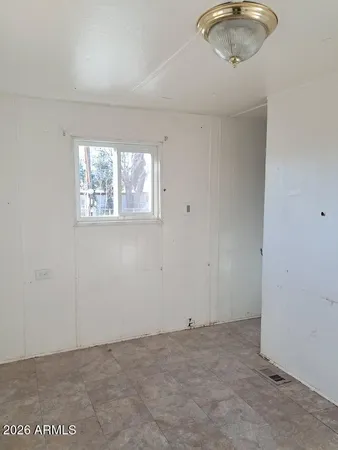 an empty room with a window