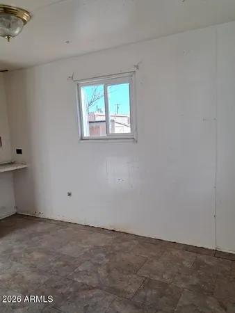 an empty room with a window