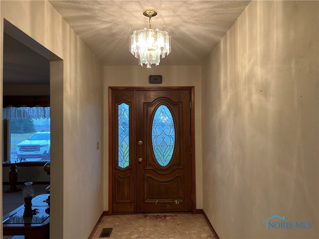 Front entry with living room to the left