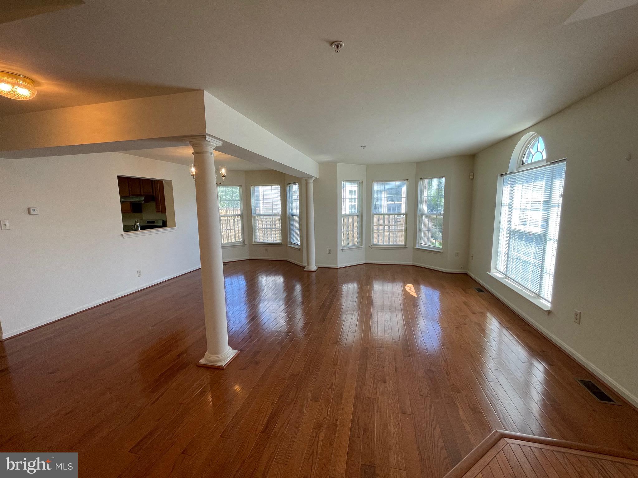 2017 Buell Drive Frederick, MD 21702 - Photo 4 of 23 wooden floor in an empty room with a window