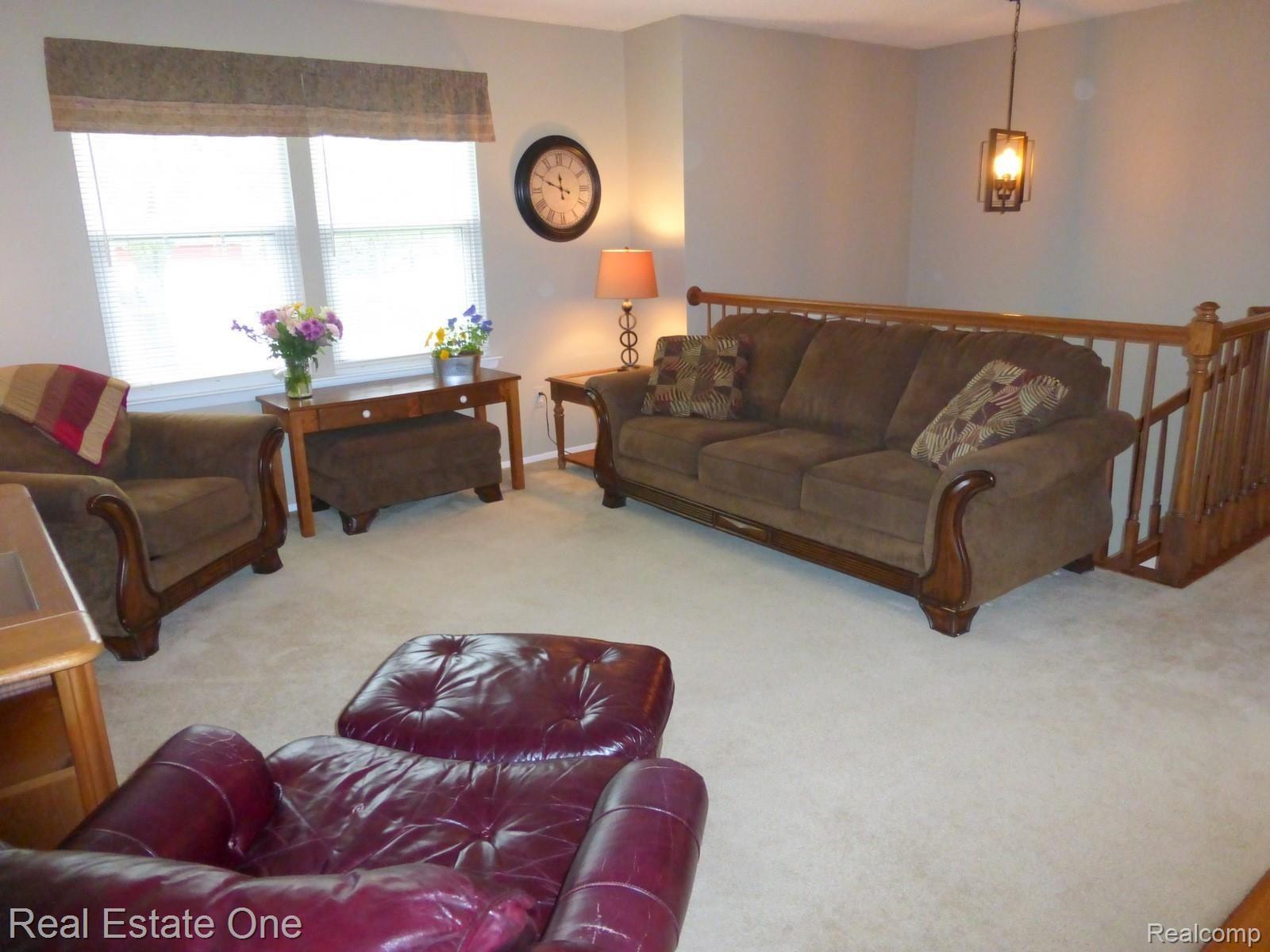 645 Hidden Ridge Drive Troy, MI 48083 - Photo 10 of 43 another view of the living room