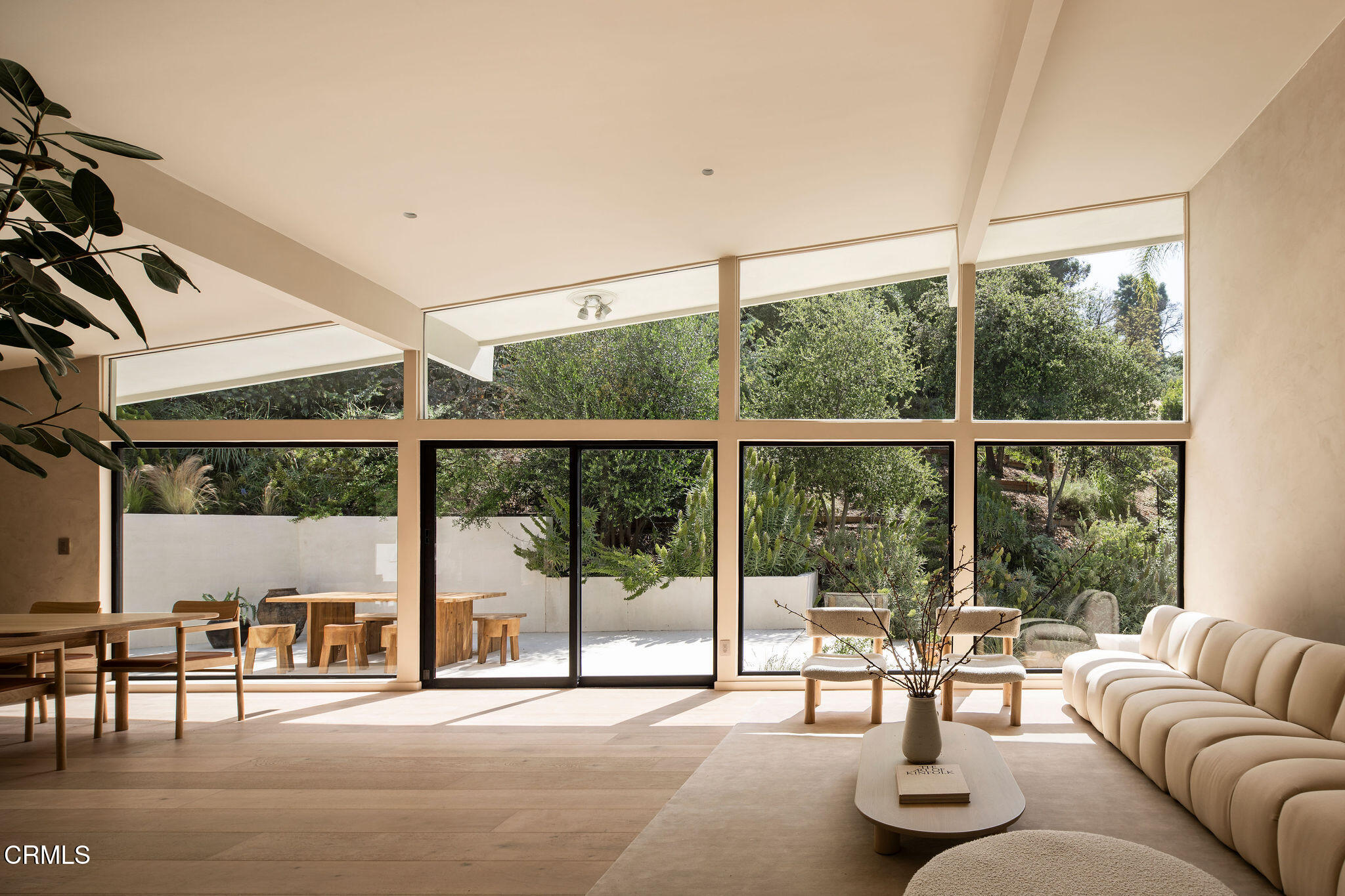 4722 Larkwood Avenue Los Angeles, CA 91364 - Photo 2 of 27 a living room with furniture and a large window with outer view