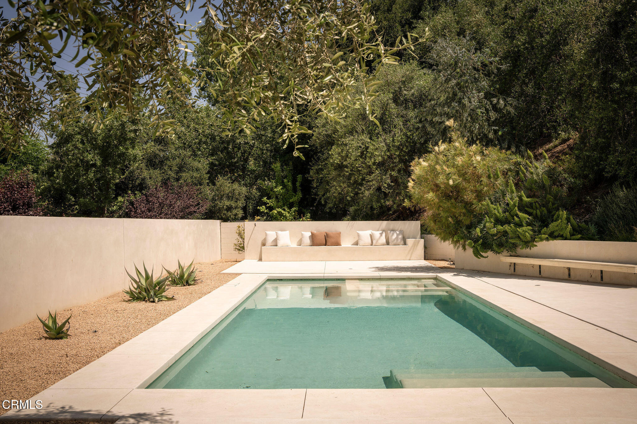 4722 Larkwood Avenue Los Angeles, CA 91364 - Photo 22 of 27 a view of a swimming pool with a yard