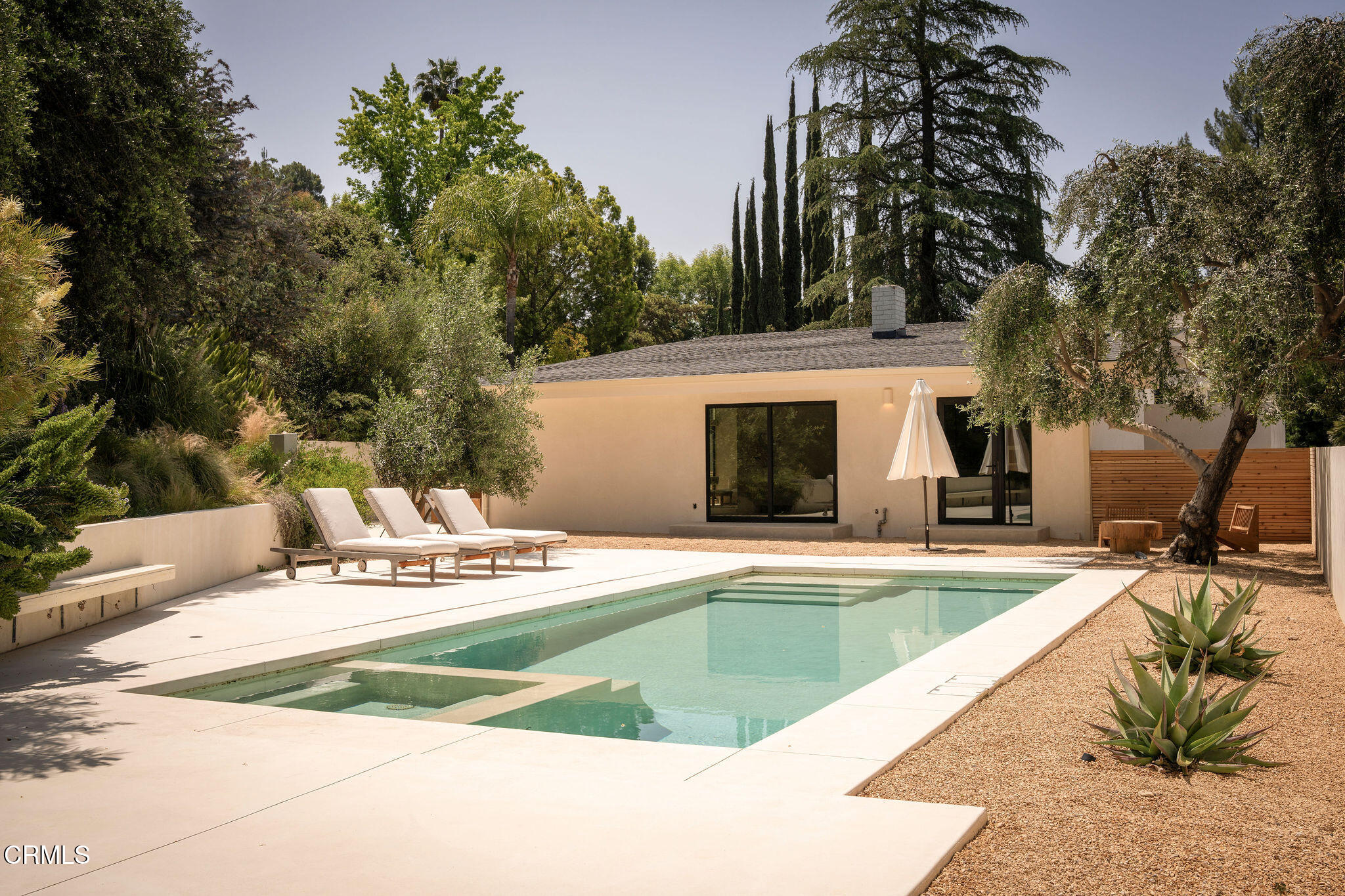 4722 Larkwood Avenue Los Angeles, CA 91364 - Photo 24 of 27 a view of a house with pool and sitting area