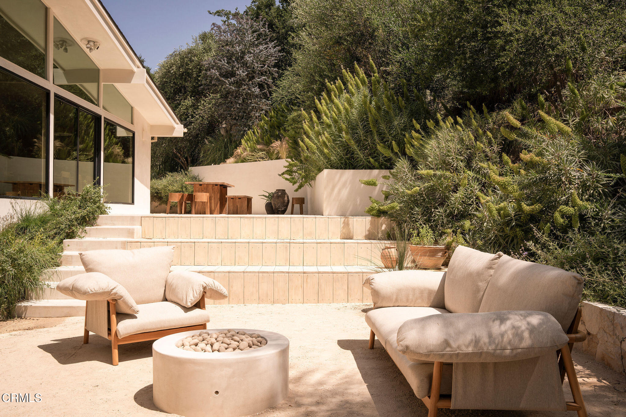 4722 Larkwood Avenue Los Angeles, CA 91364 - Photo 25 of 27 a view of a patio with couches and potted plants