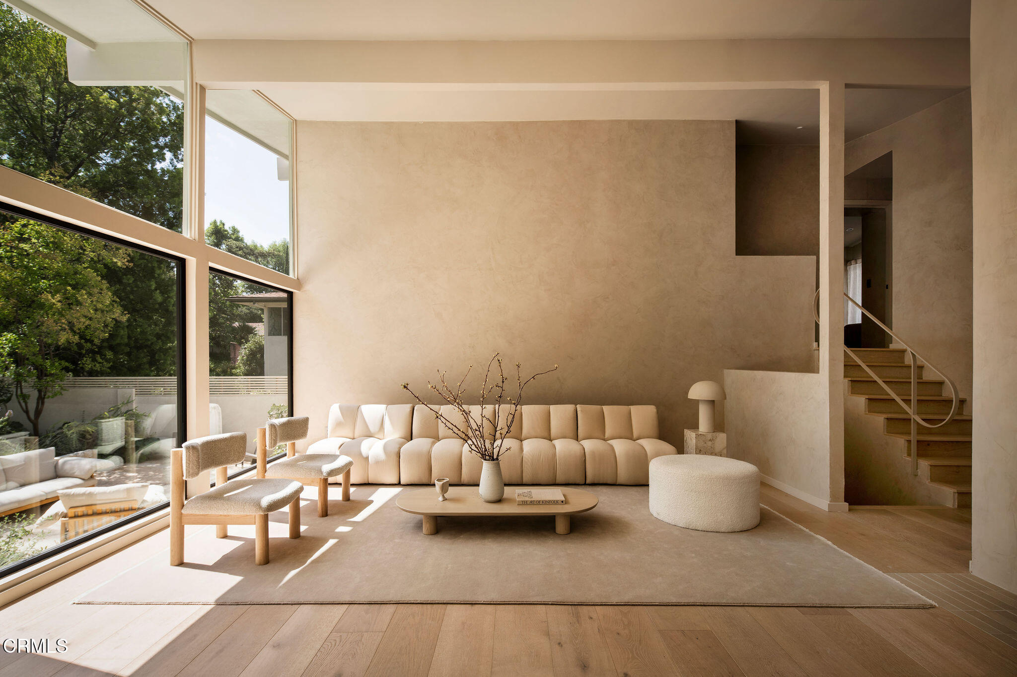 4722 Larkwood Avenue Los Angeles, CA 91364 - Photo 3 of 27 a living room with furniture and a floor to ceiling window