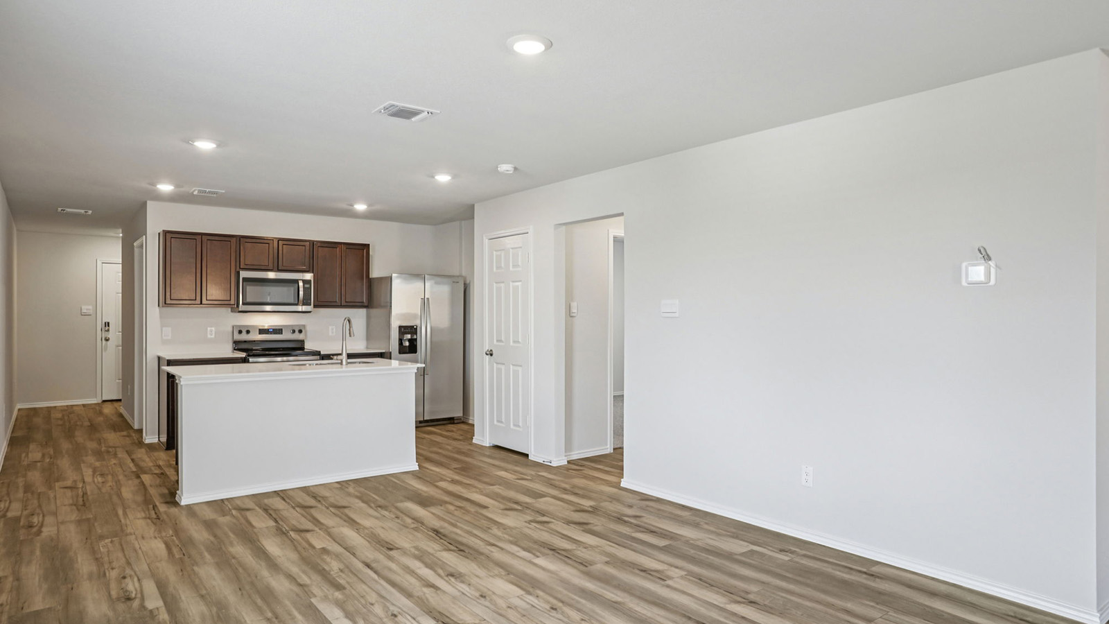 149 Wyatt Way Jarrell, TX 76537 - Photo 20 of 30 a view of kitchen with wooden floor