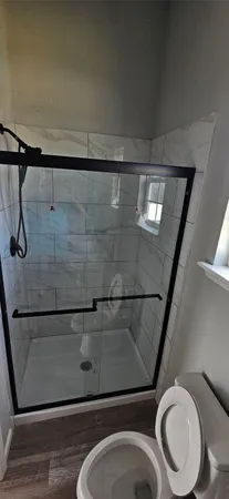 a bathroom with a toilet and a sink