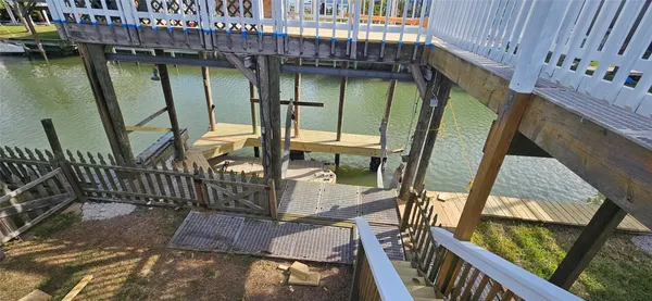 a view of balcony with wooden floor