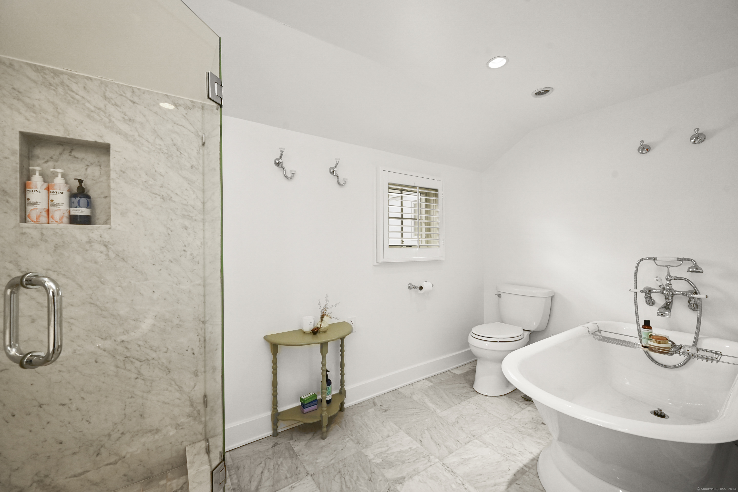 104 Roton Avenue Norwalk, CT 06853 - Photo 23 of 40 a bathroom with a sink a toilet and shower