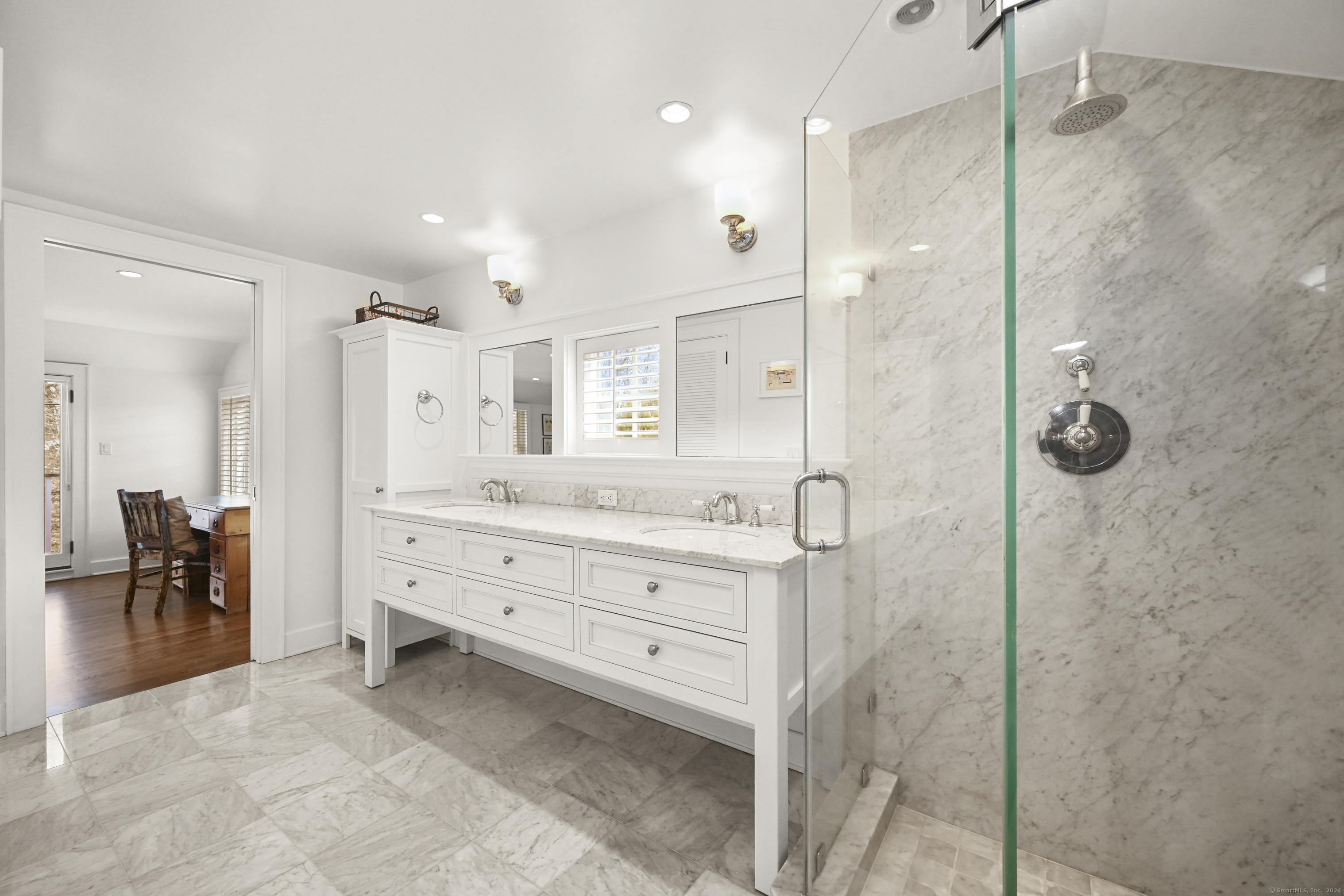 104 Roton Avenue Norwalk, CT 06853 - Photo 24 of 40 a bathroom with a granite countertop sink mirror and shower