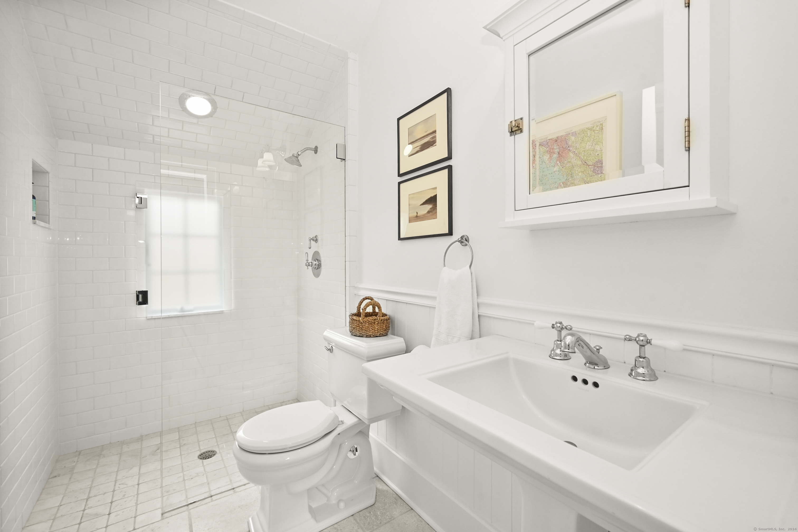 104 Roton Avenue Norwalk, CT 06853 - Photo 27 of 40 a bathroom with a sink toilet and shower
