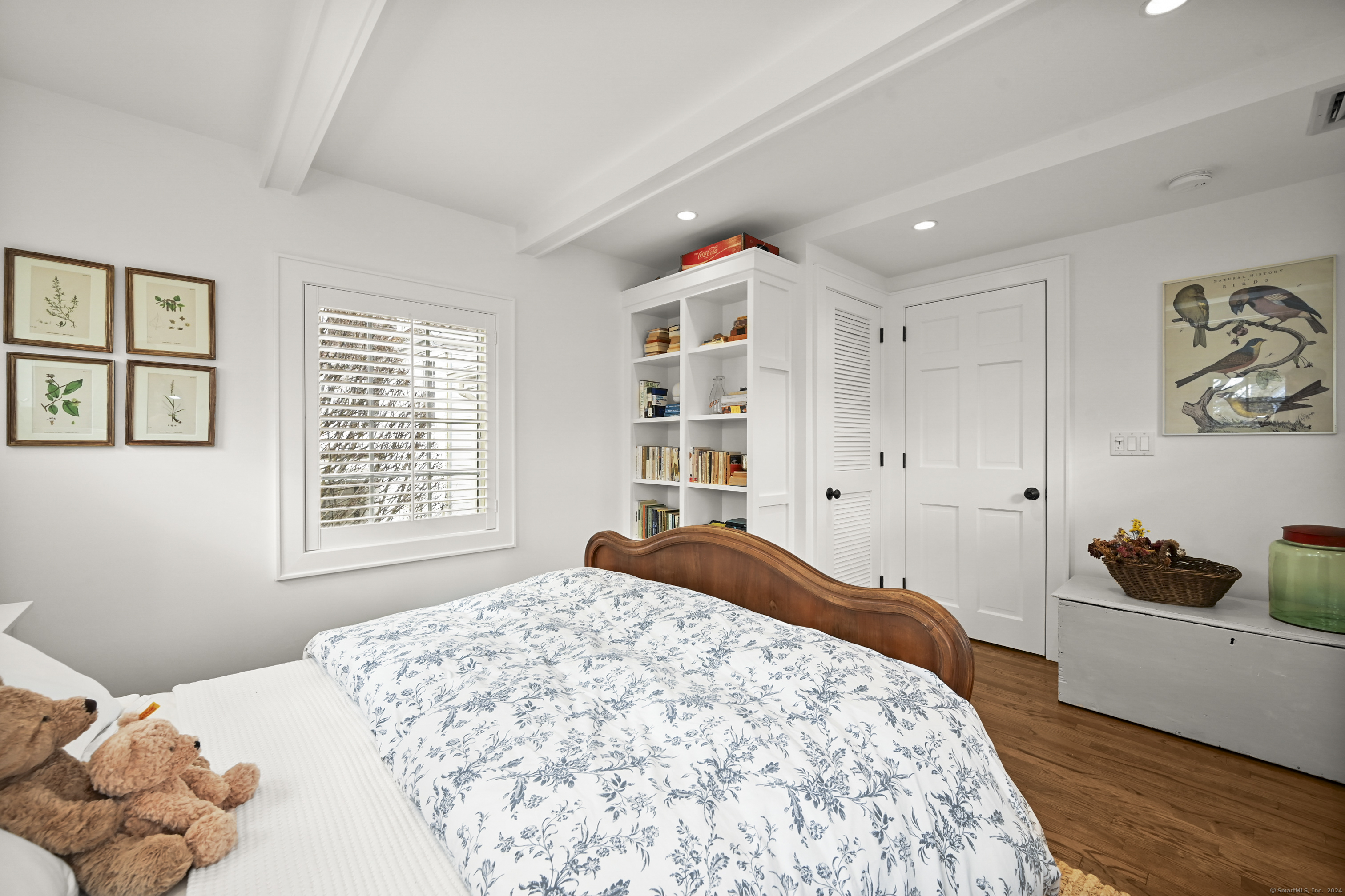 104 Roton Avenue Norwalk, CT 06853 - Photo 29 of 40 a bedroom with a large bed and a window