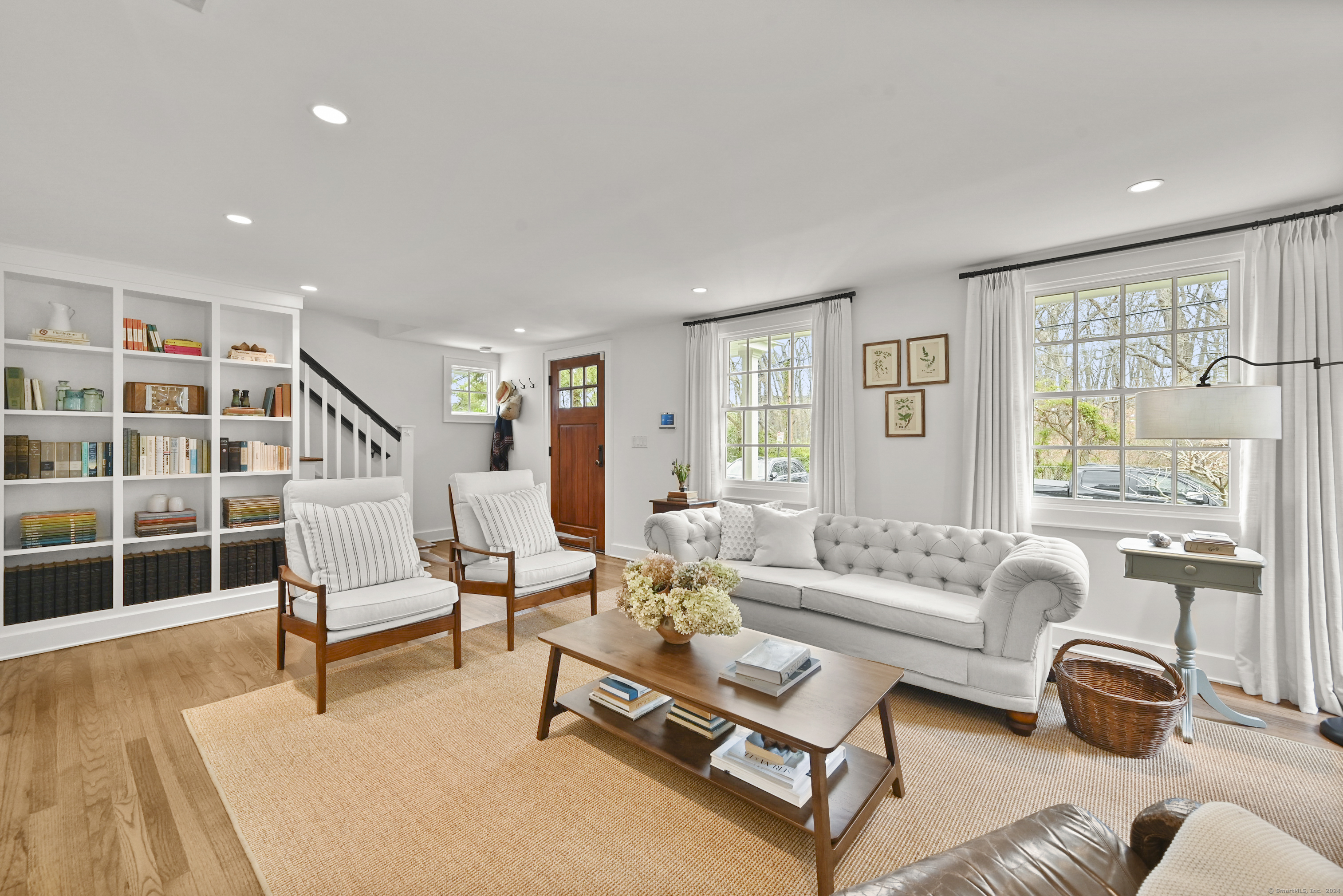 104 Roton Avenue Norwalk, CT 06853 - Photo 3 of 40 a living room with furniture and a large window