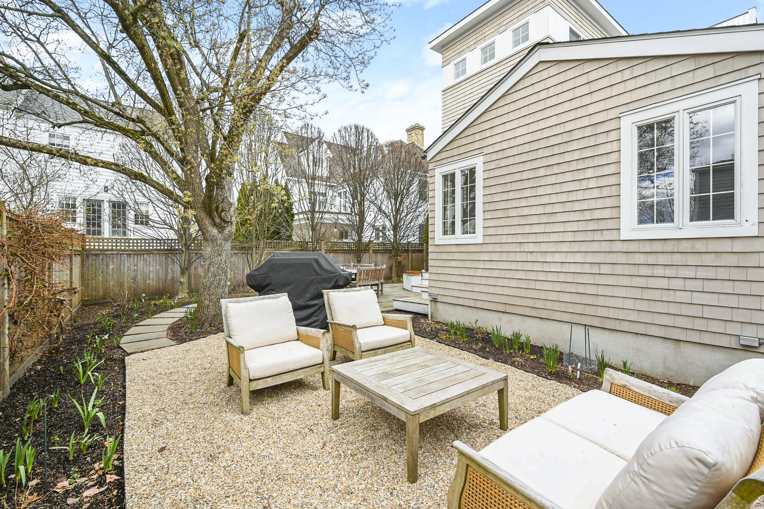 104 Roton Avenue Norwalk, CT 06853 - Photo 36 of 40 a view of a patio with a yard