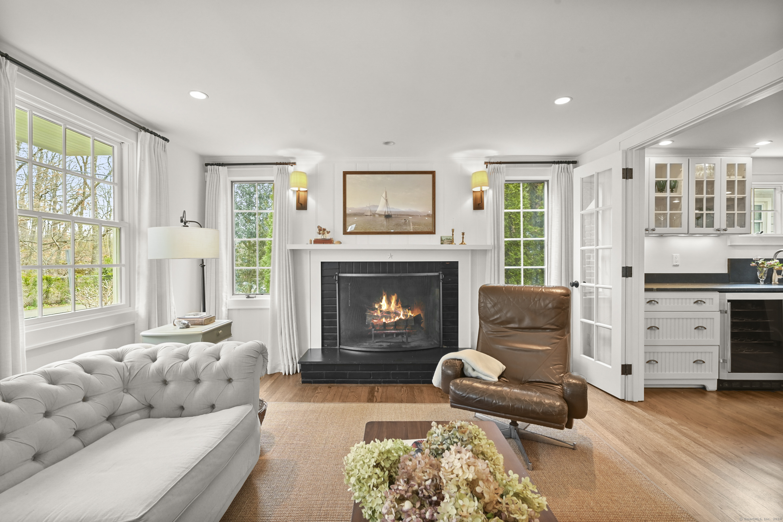 104 Roton Avenue Norwalk, CT 06853 - Photo 5 of 40 a living room with furniture and a fireplace