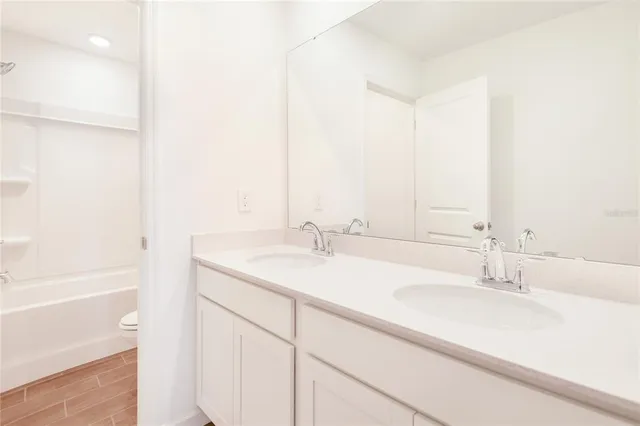 a bathroom with a sink and a bathtub