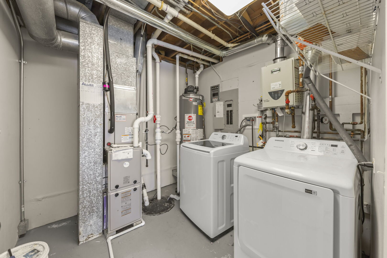 338 Hiawatha Drive Lake In The Hills, IL 60156 - Photo 31 of 49 a utility room with dryer and washer