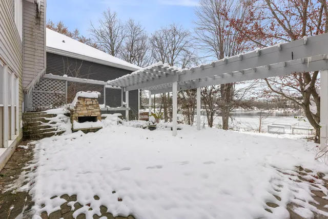 a view of a swimming pool and a yard