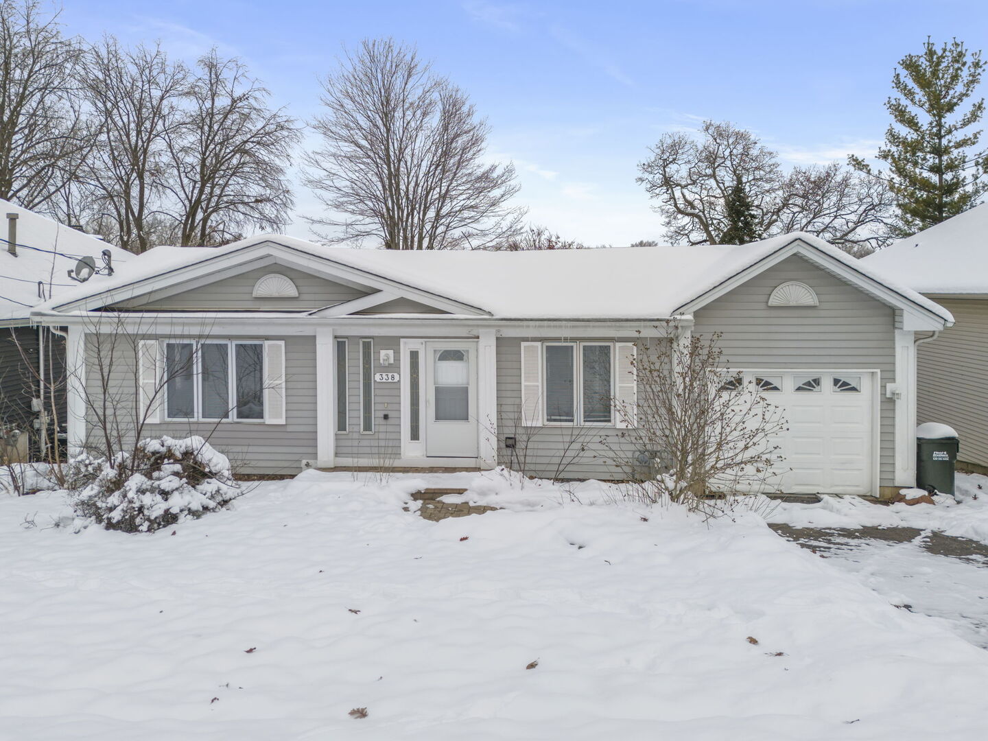 338 Hiawatha Drive Lake In The Hills, IL 60156 - Photo 46 of 49 a front view of a house with a yard