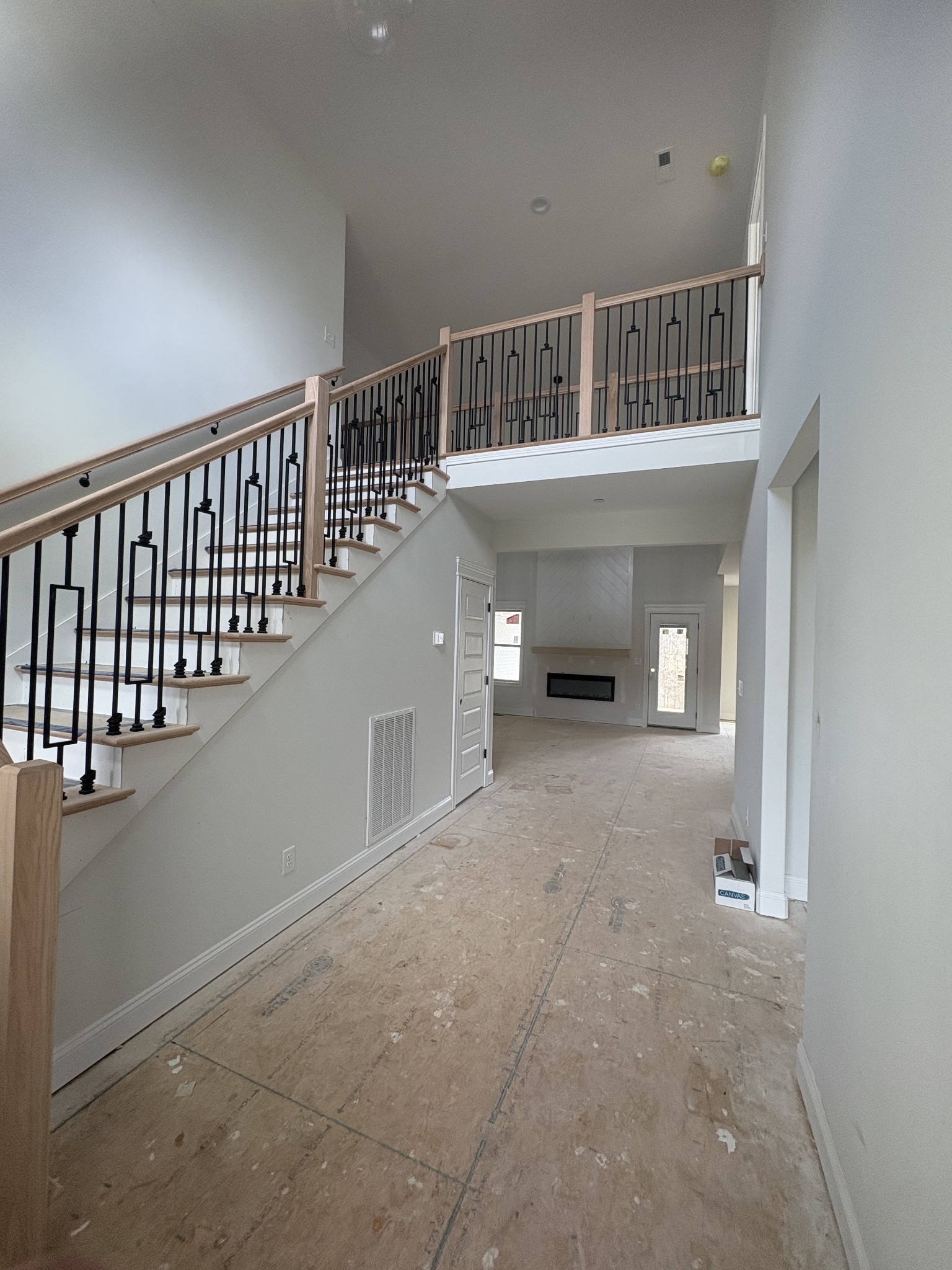 353 Young Lane Pleasant View, TN 37146 - Photo 3 of 26 a view empty room with staircase and a window