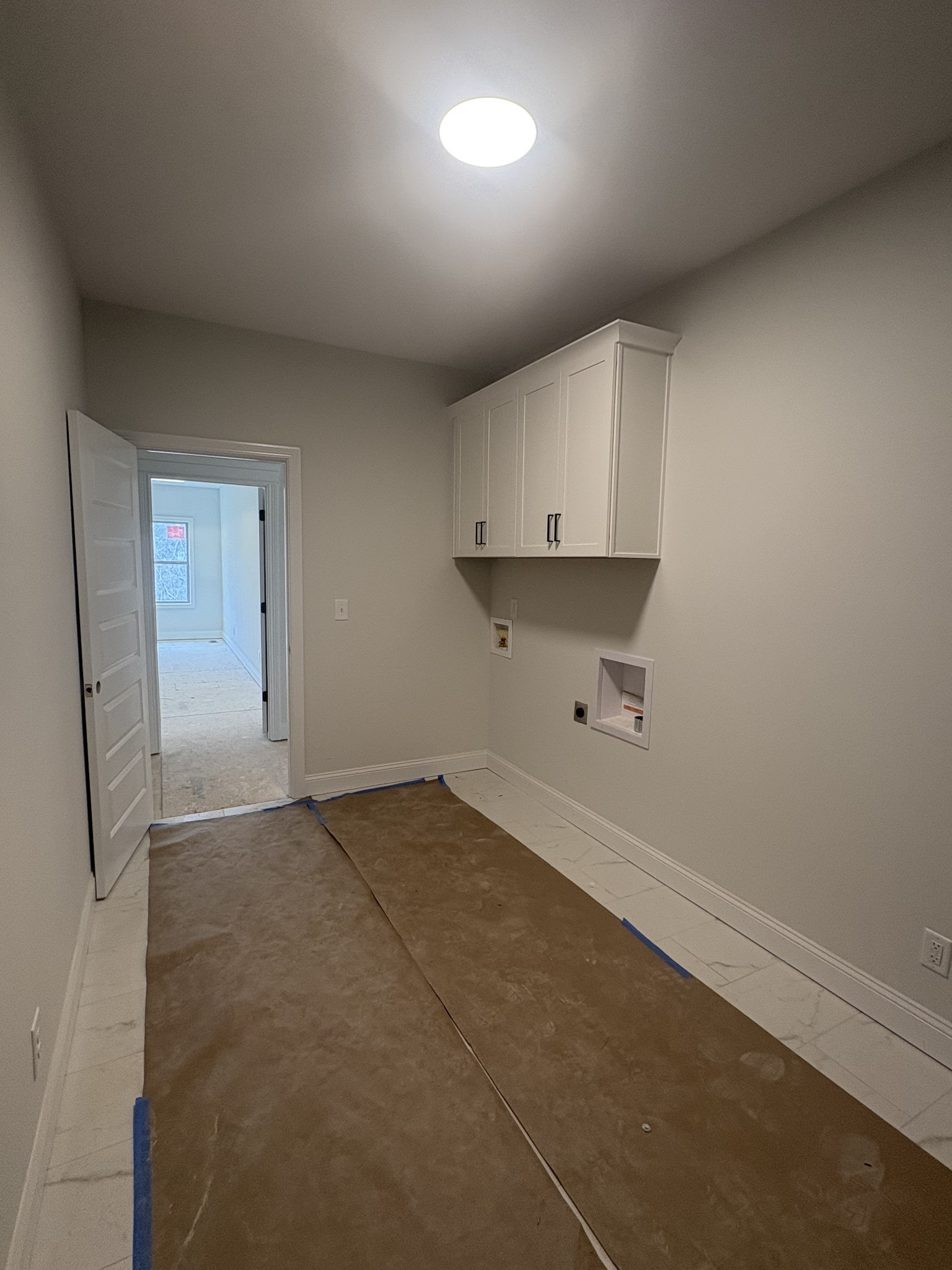 353 Young Lane Pleasant View, TN 37146 - Photo 5 of 26 an empty room with cabinet and mirrors