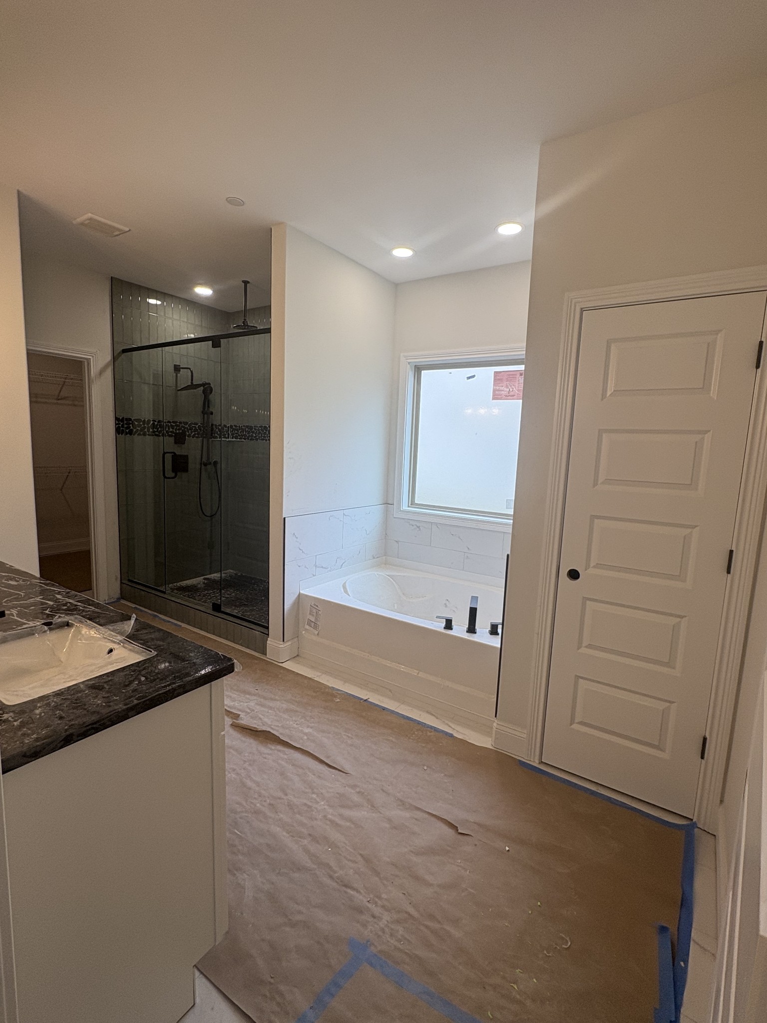 353 Young Lane Pleasant View, TN 37146 - Photo 8 of 26 a bathroom with a granite countertop sink a toilet a mirror and shower