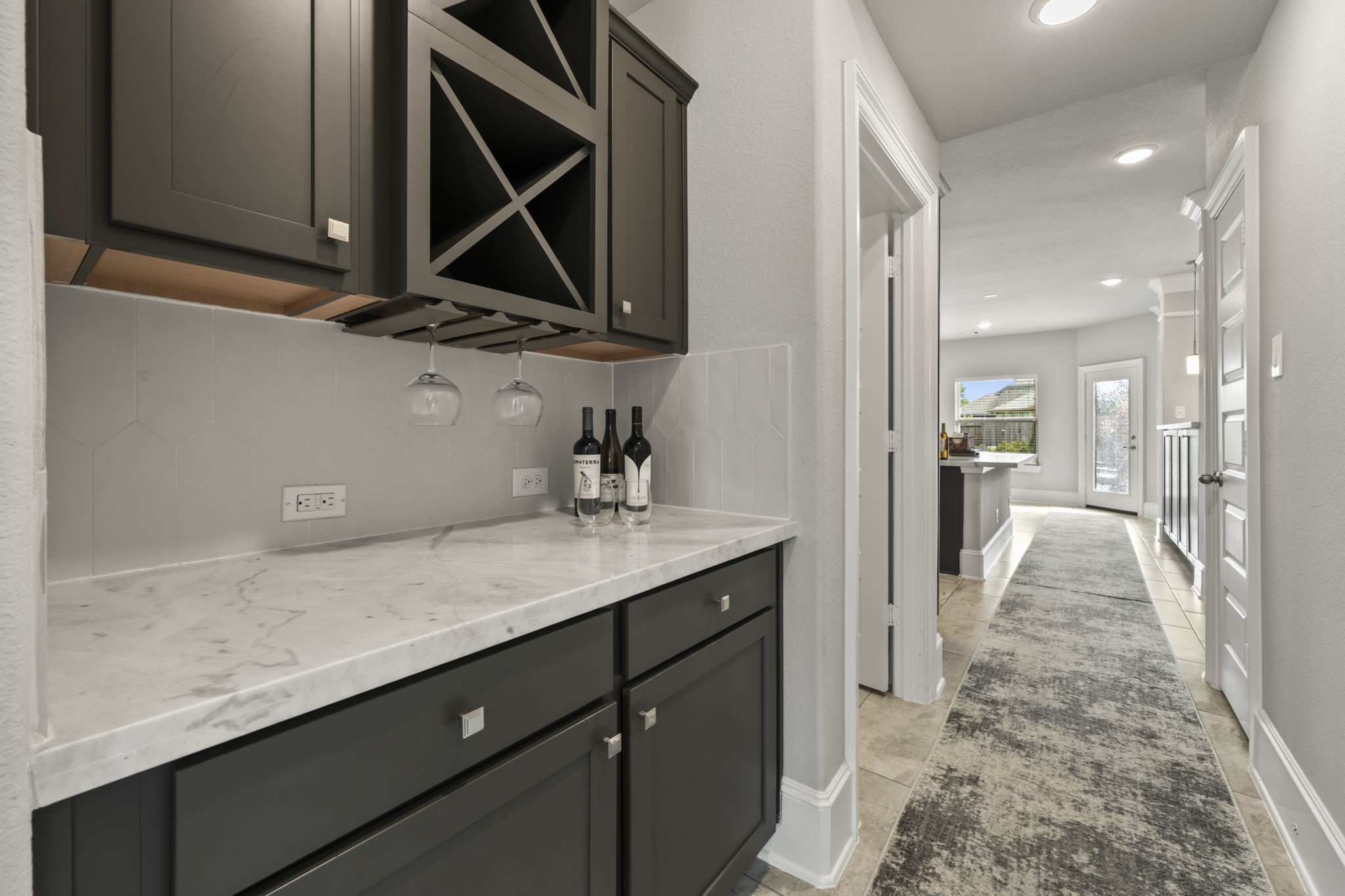3938 Avalon Ridge Drive Spring, TX 77386 - Photo 13 of 49 This butlers pantry offers more storage and serving space
