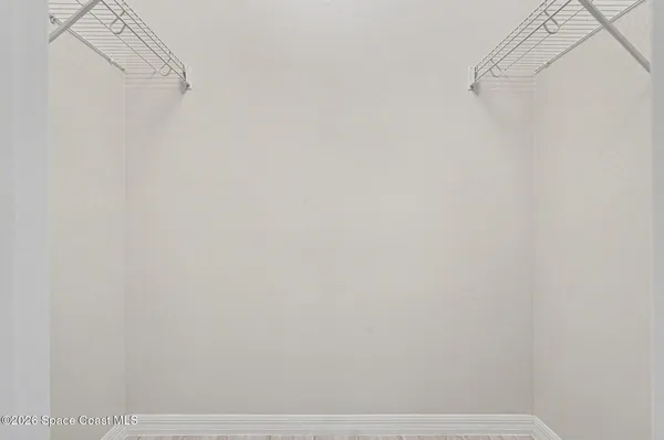 a view of small space with racks on the wall
