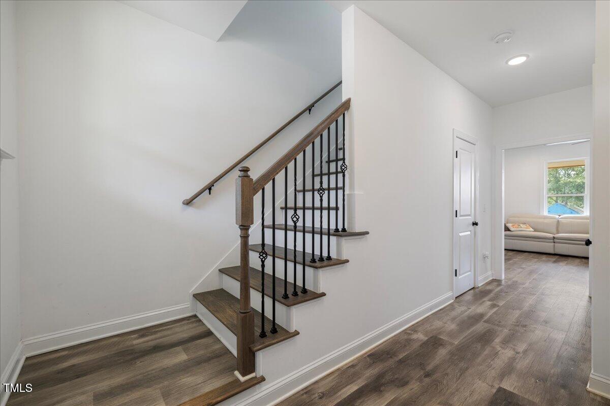 5421 West Old Spring Hope Road Spring Hope, NC 27882 - Photo 12 of 54 a view of entryway with wooden floor and stairs