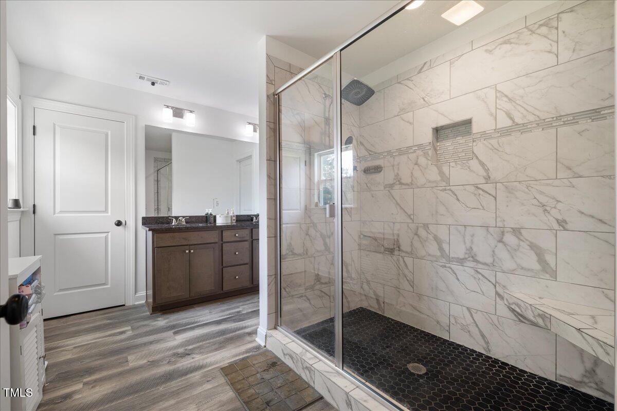 5421 West Old Spring Hope Road Spring Hope, NC 27882 - Photo 17 of 54 a bathroom with a shower and a sink