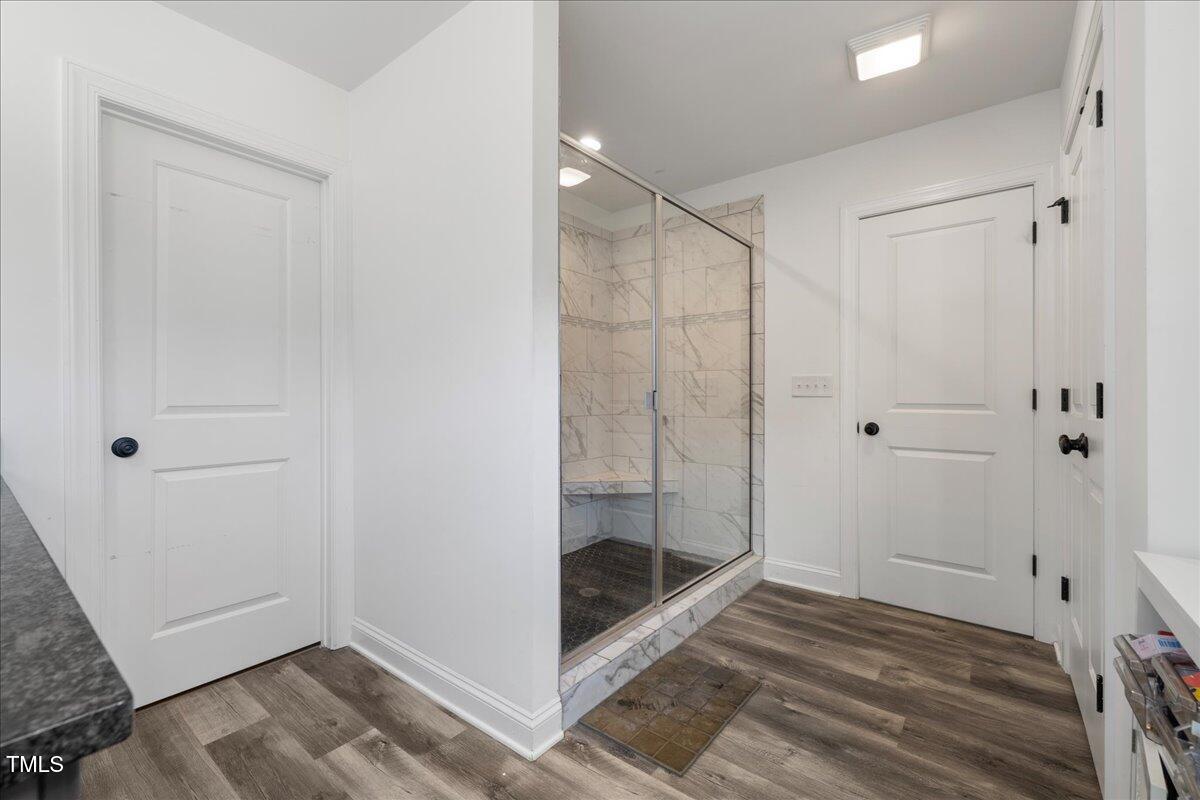 5421 West Old Spring Hope Road Spring Hope, NC 27882 - Photo 18 of 54 a bathroom with a shower and toilet