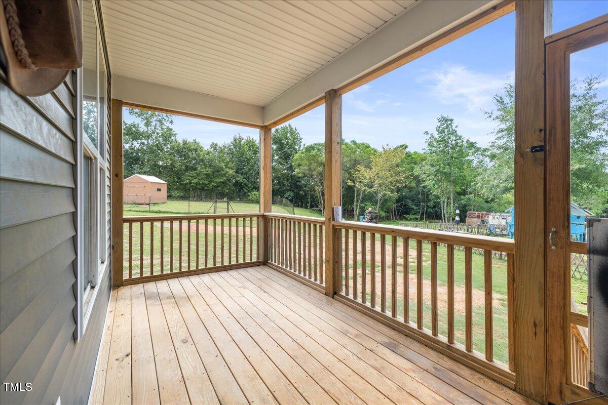5421 West Old Spring Hope Road Spring Hope, NC 27882 - Photo 32 of 54 a view of a wooden deck