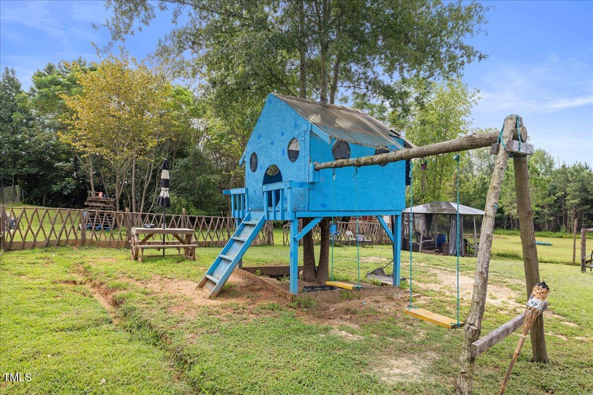 5421 West Old Spring Hope Road Spring Hope, NC 27882 - Photo 41 of 54 a view of a house with a park