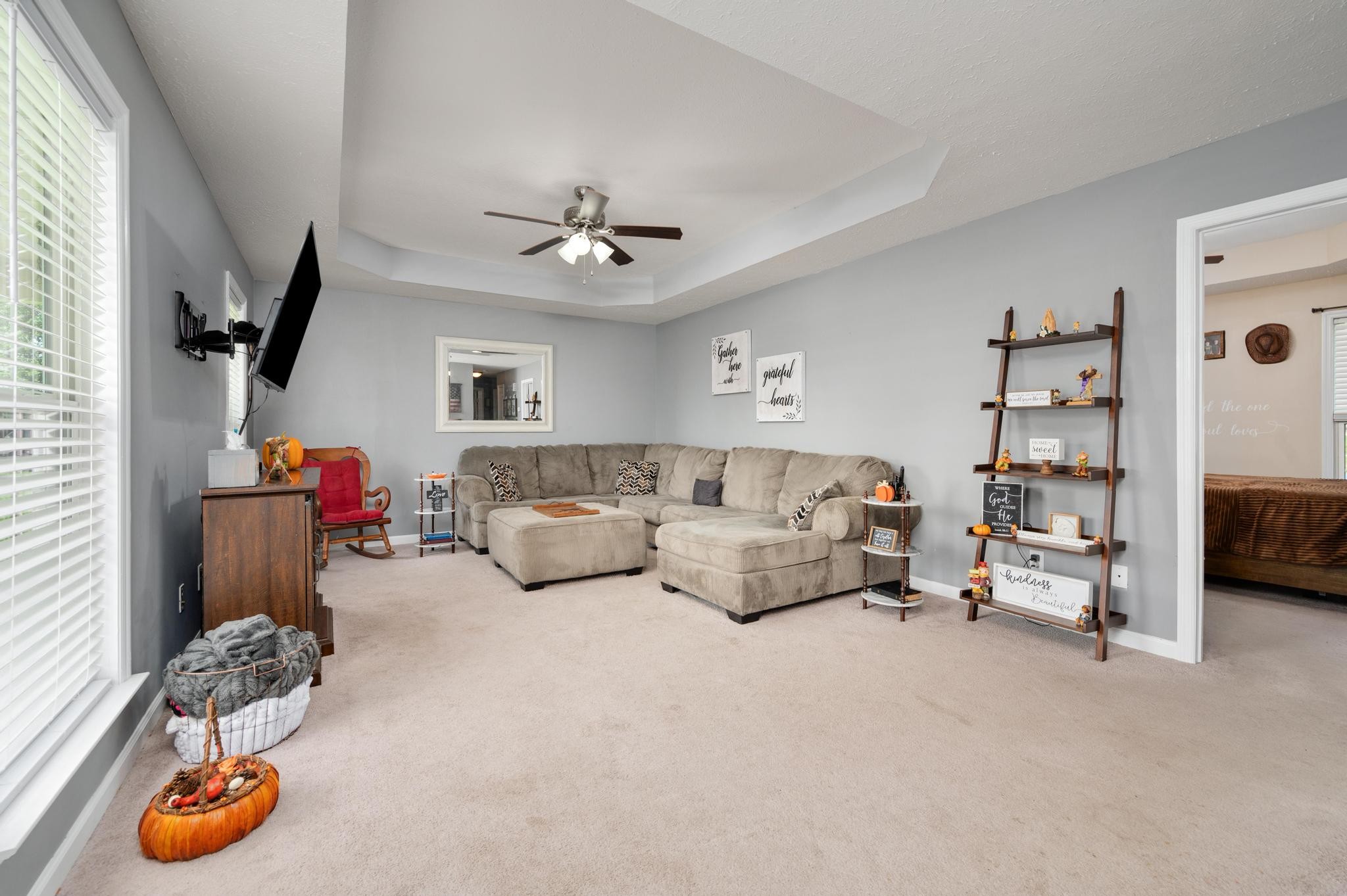 7040 Charity Road Petersburg, TN 37144 - Photo 15 of 36 a living room with furniture and a flat screen tv