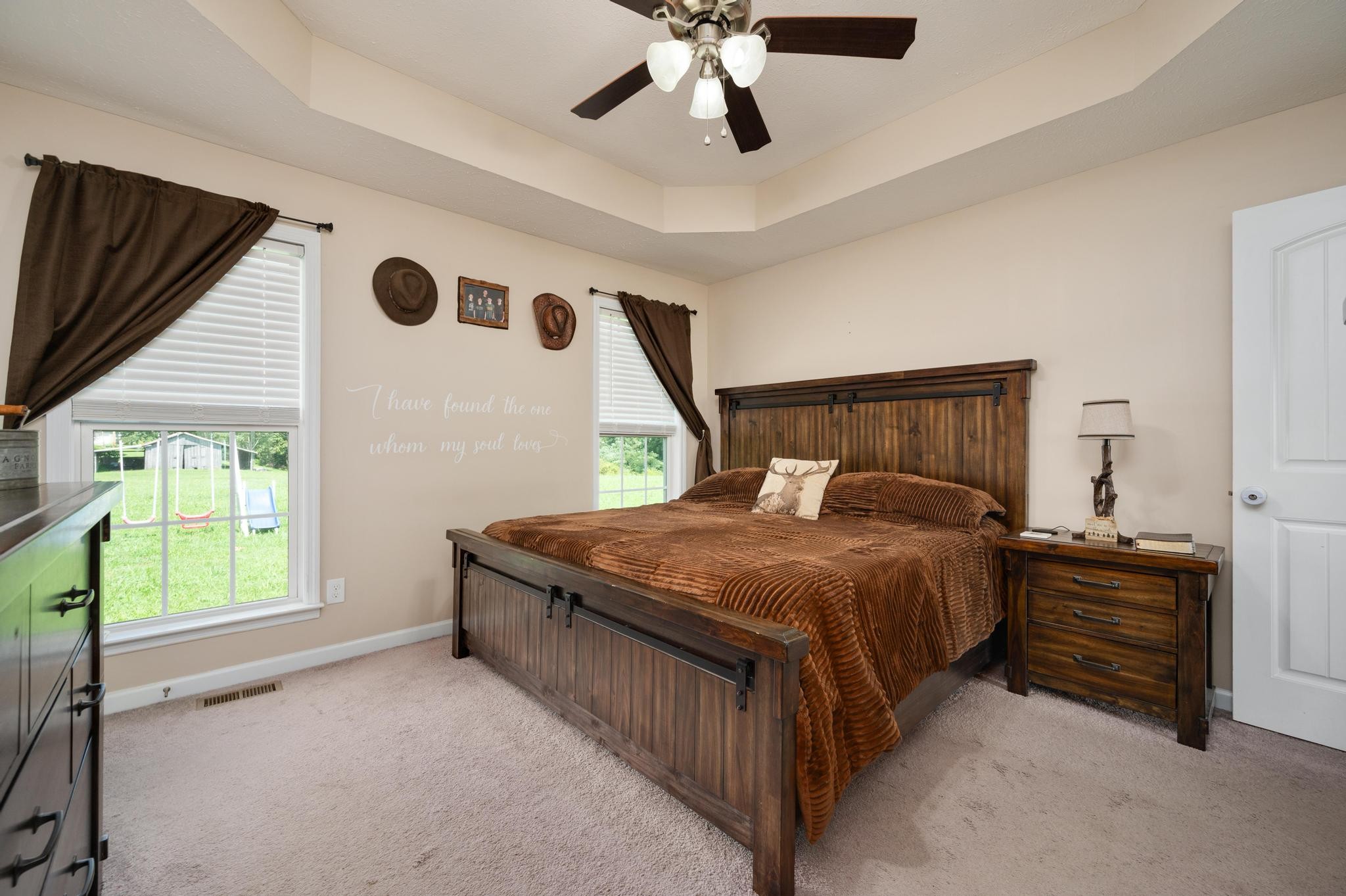 7040 Charity Road Petersburg, TN 37144 - Photo 16 of 36 a bedroom with a bed and a large window